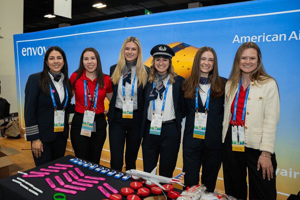 International aviation maintenance professionals networking at a global MRO event