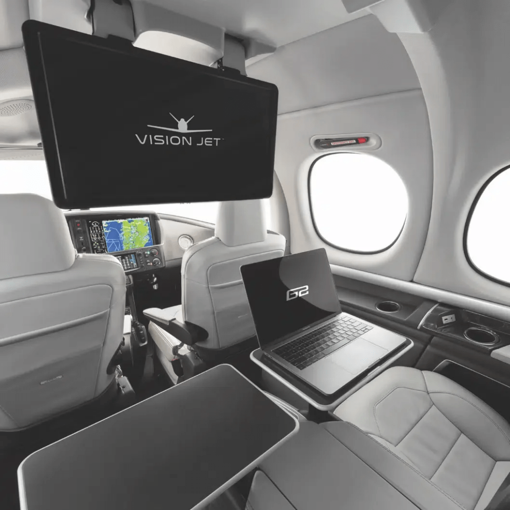 Interior cabin of the Cirrus Vision Jet SF50 showing compact seating for small groups