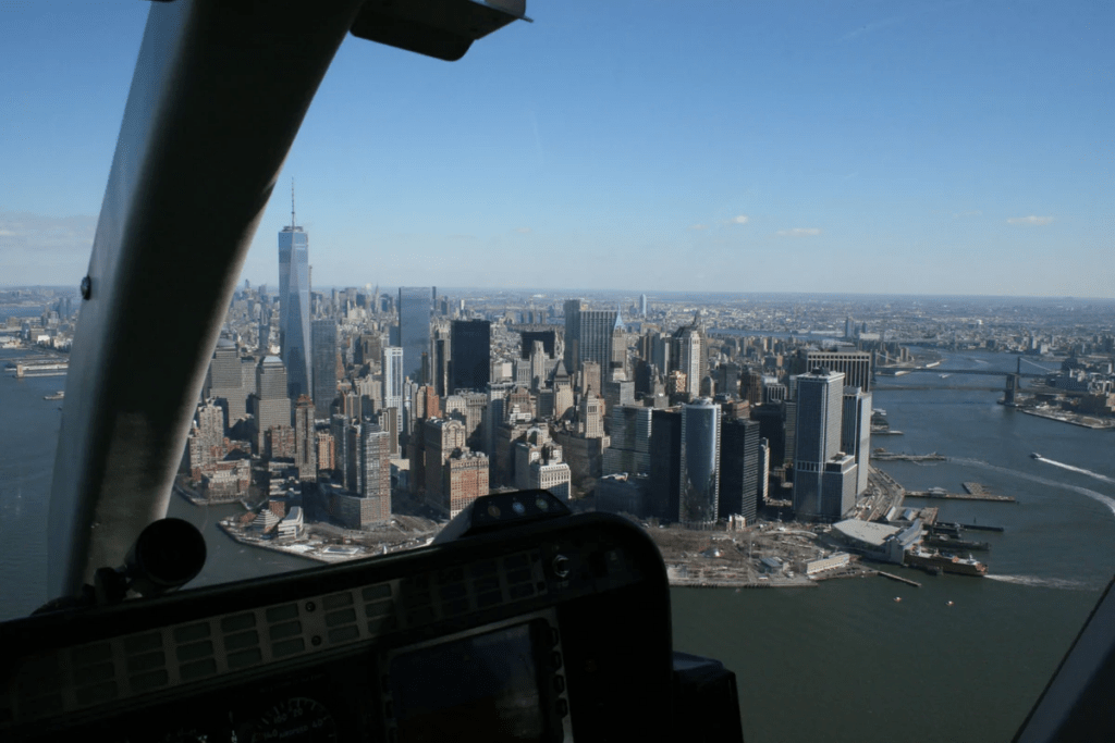 Helicopter cockpit view overlooking city skyline highlighting variety of Houston tour options