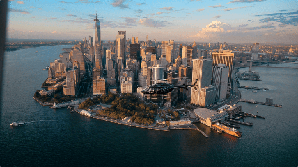 Helicopter flying over city skyline showcasing customizable routes and personalized aerial experiences