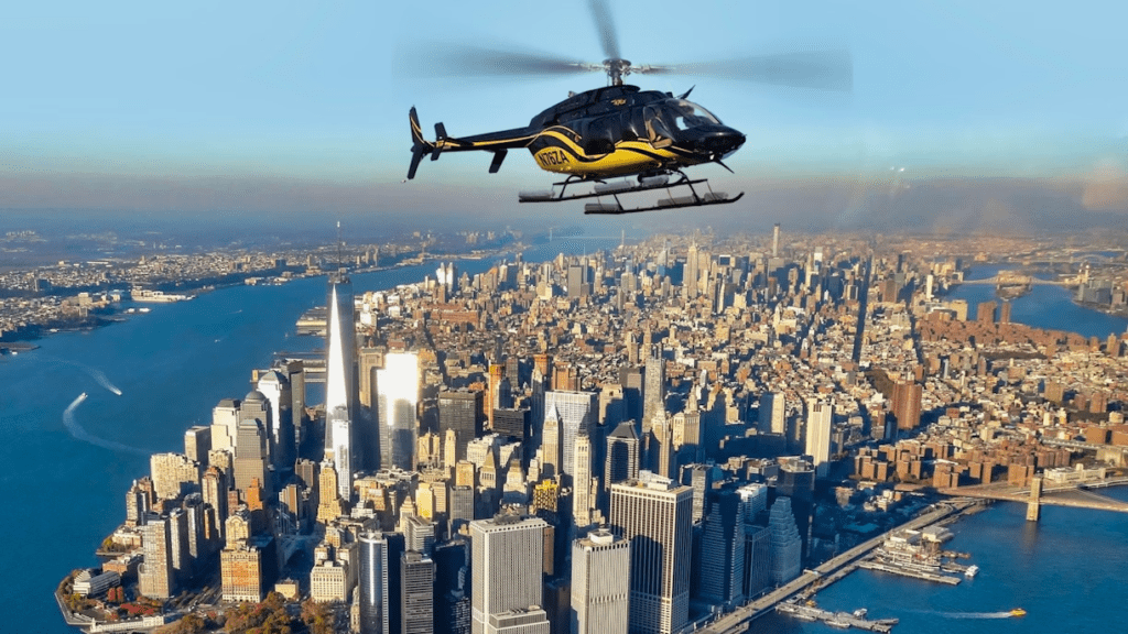 Helicopter flying above city skyline illustrating booking and availability of aerial tours