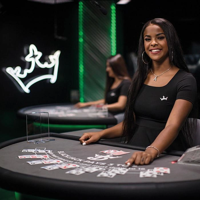 Live casino blackjack table with real dealer streaming online gambling session